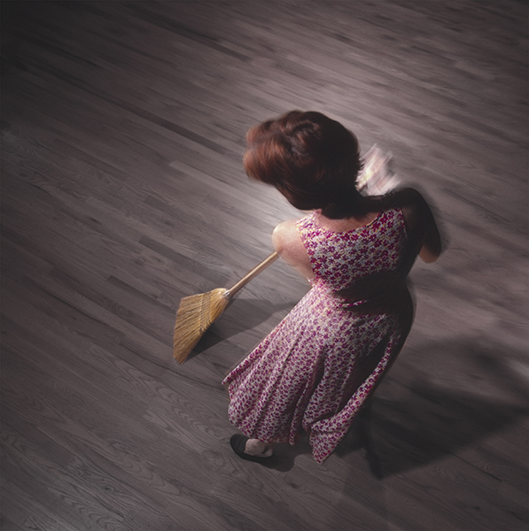 woman sweeping