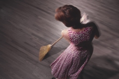 woman sweeping