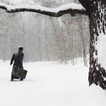 Man Walking in Snow
