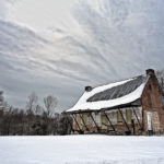 Boarded House in Snow